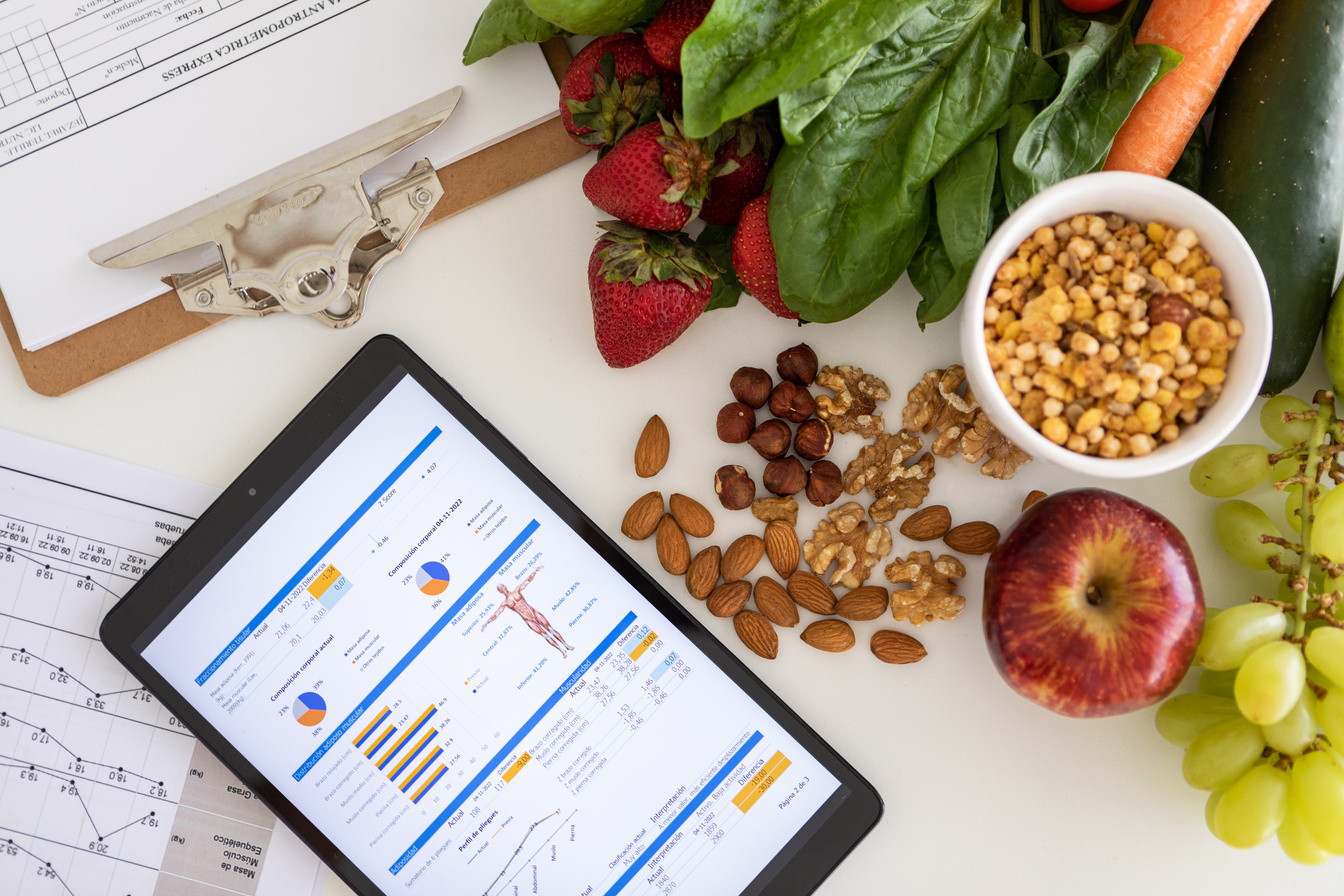 Digital nutritional program with heathy food and digital tablet charts